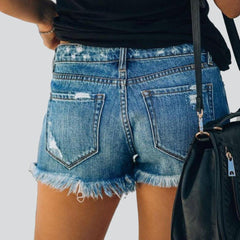 Ripped jeans shorts with buttons